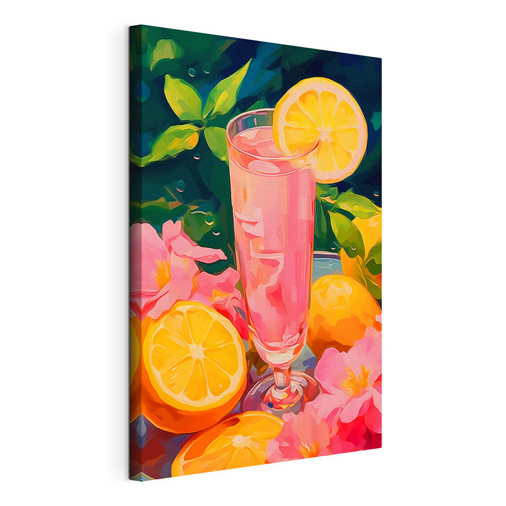 Glass of pink liquid with lemons and flowers