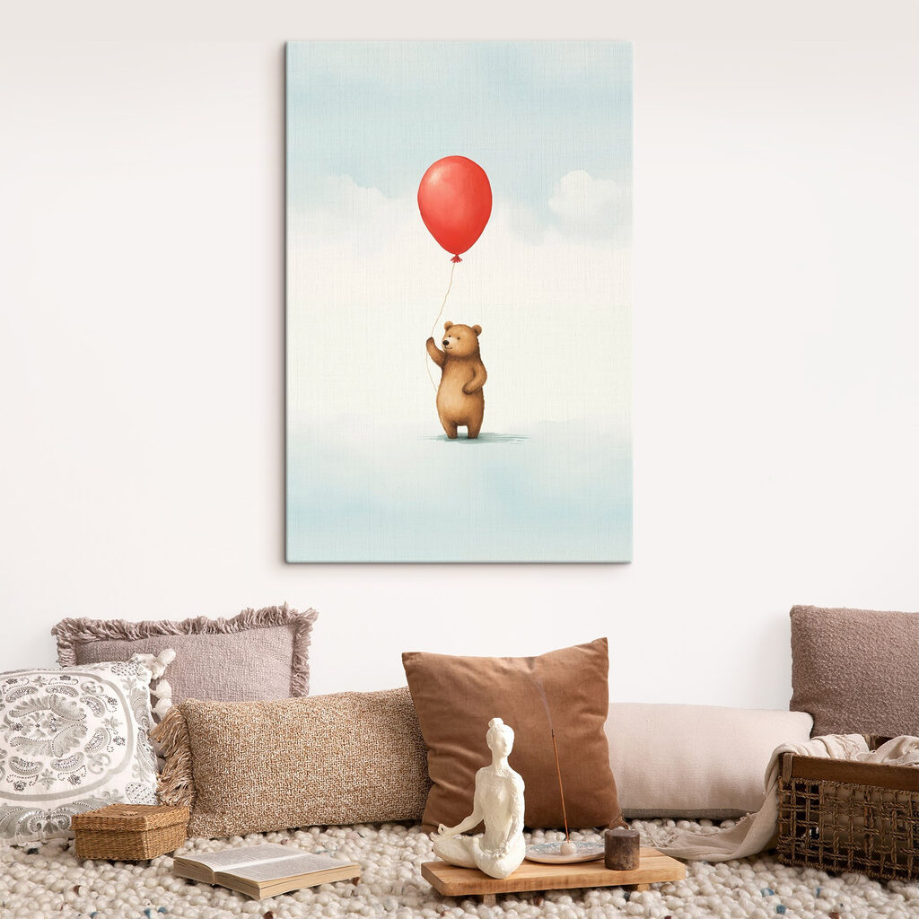 Bear holding a red balloon