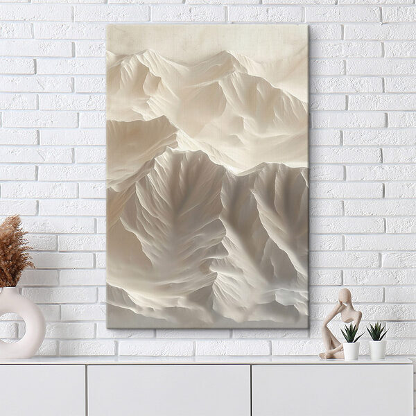 White mountain range with many layers of snow