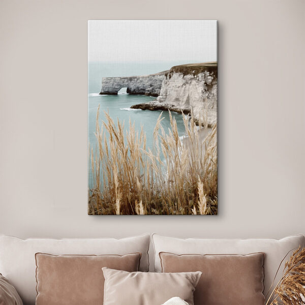 Tall grass next to a body of water
