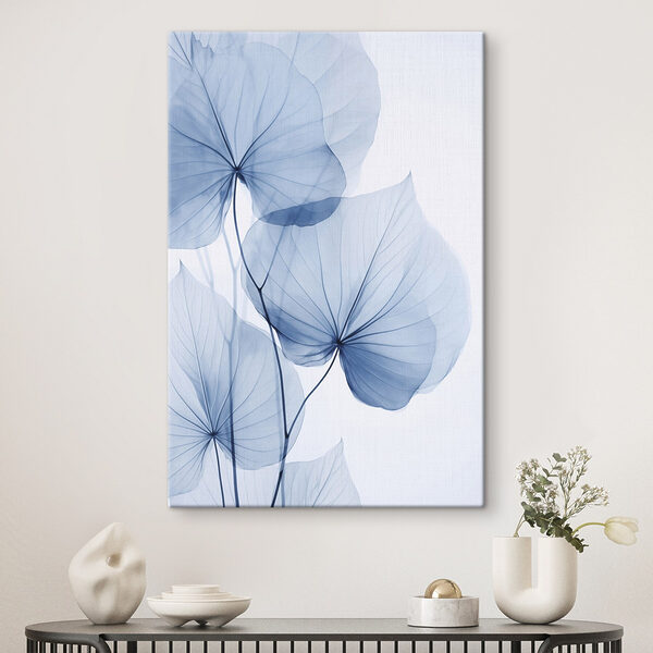 Delicate blue leaves on pale background