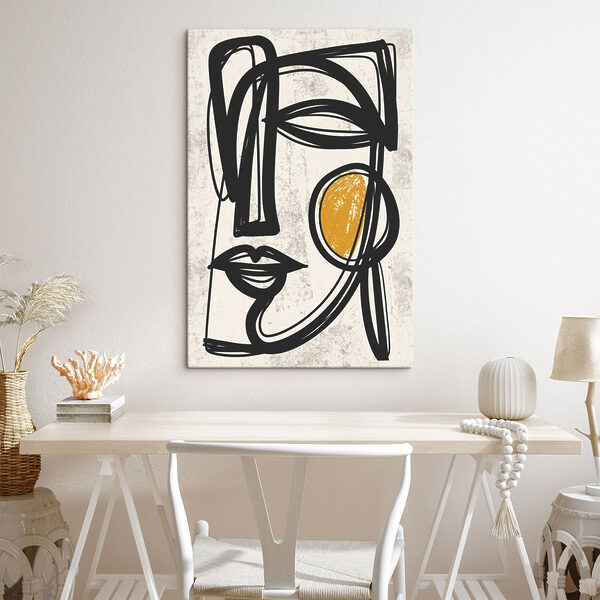 Black and yellow drawing of a face